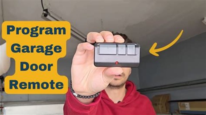 How do I program my overhead garage door opener remote?