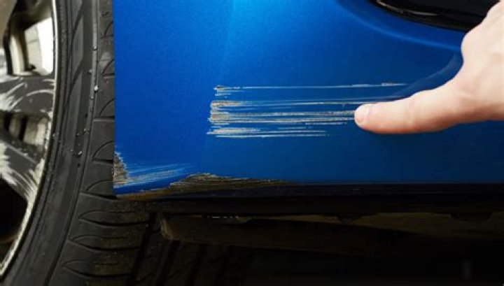 How do you get scratches out of a shower tray?