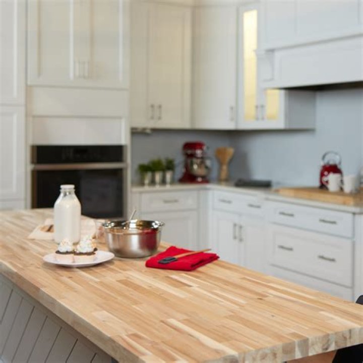 How do you stain and finish a butcher block countertop?