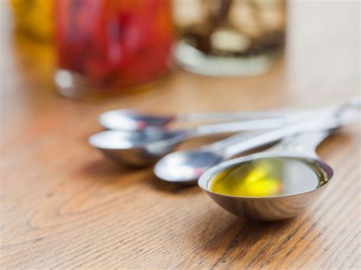 Is 2 tablespoons of olive oil a day too much?