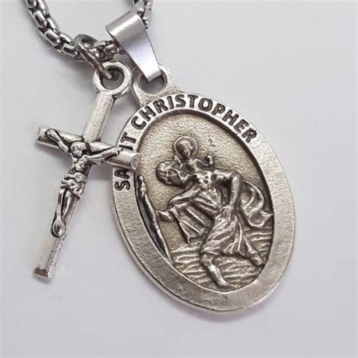 What is the story behind the Saint Christopher necklace?